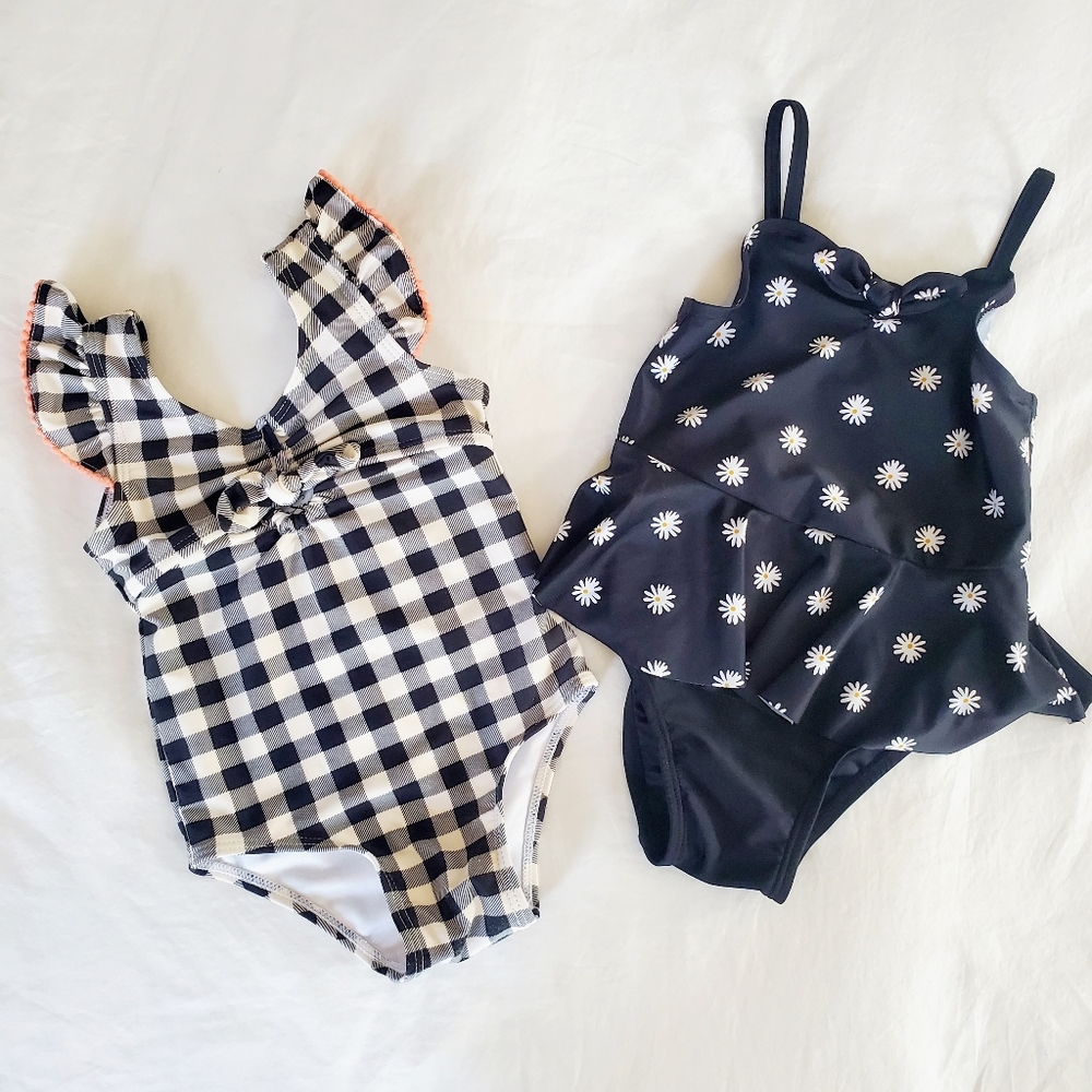 Two baby girl swim suits